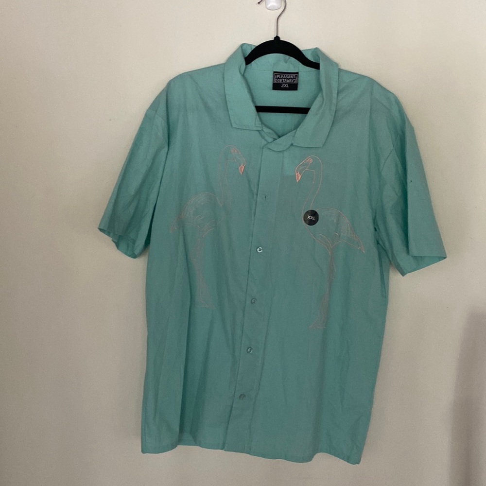 Light blue button up shirt with flamingo design